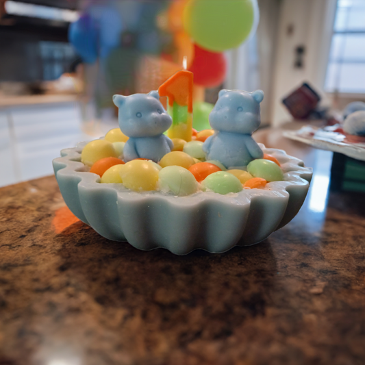 A cute birthday bear candle in a bowl, with a colorful party hat, perfect for kids ages 1–8 Scent Fushion Candles

