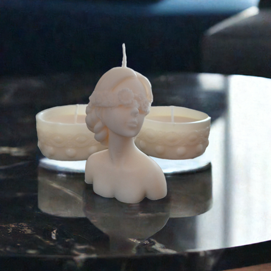 Hand-poured flower girl candle art piece with two side wax candles made in West Virginia by Scent Fushion Candles.