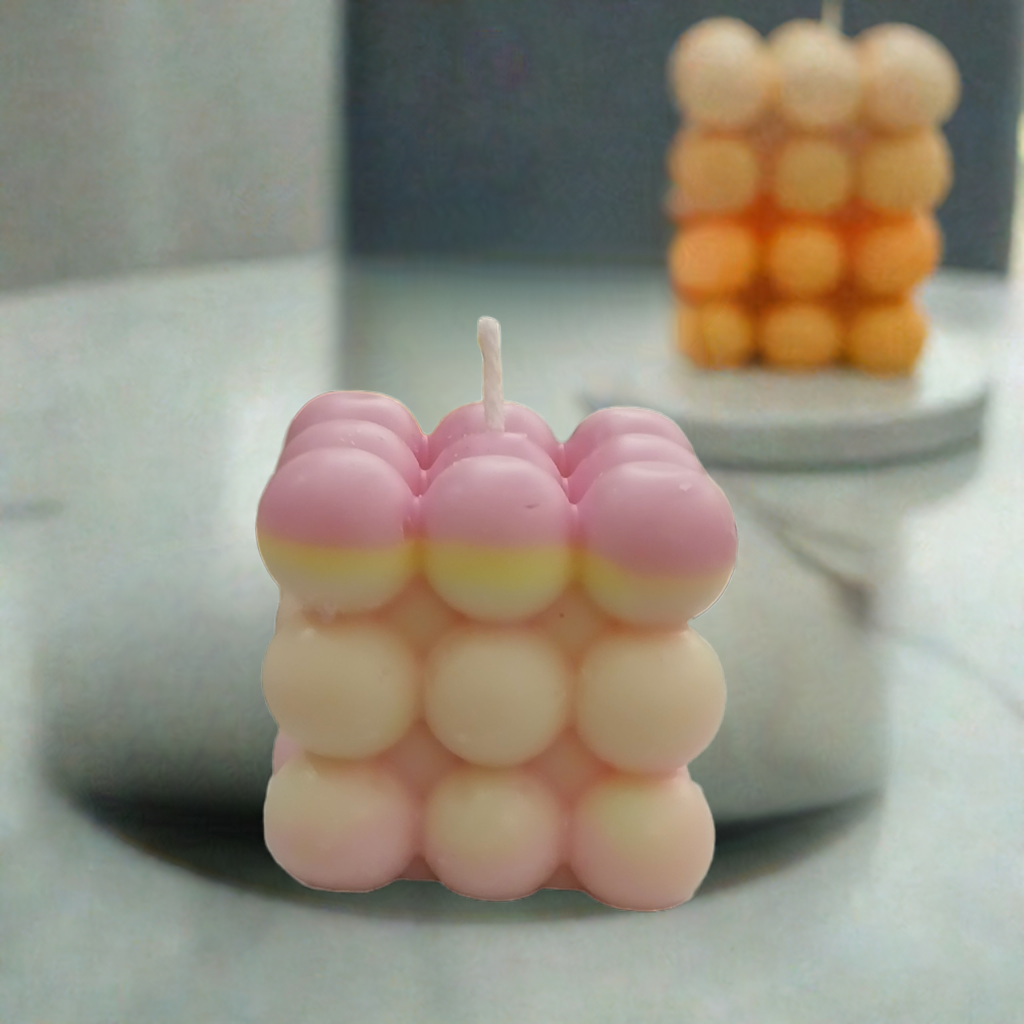 Rainbow bubble candle with colorful wax in gift-ready packaging