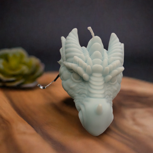 Close-up of dragon head candle detailing with smoky Shadow Ember scent