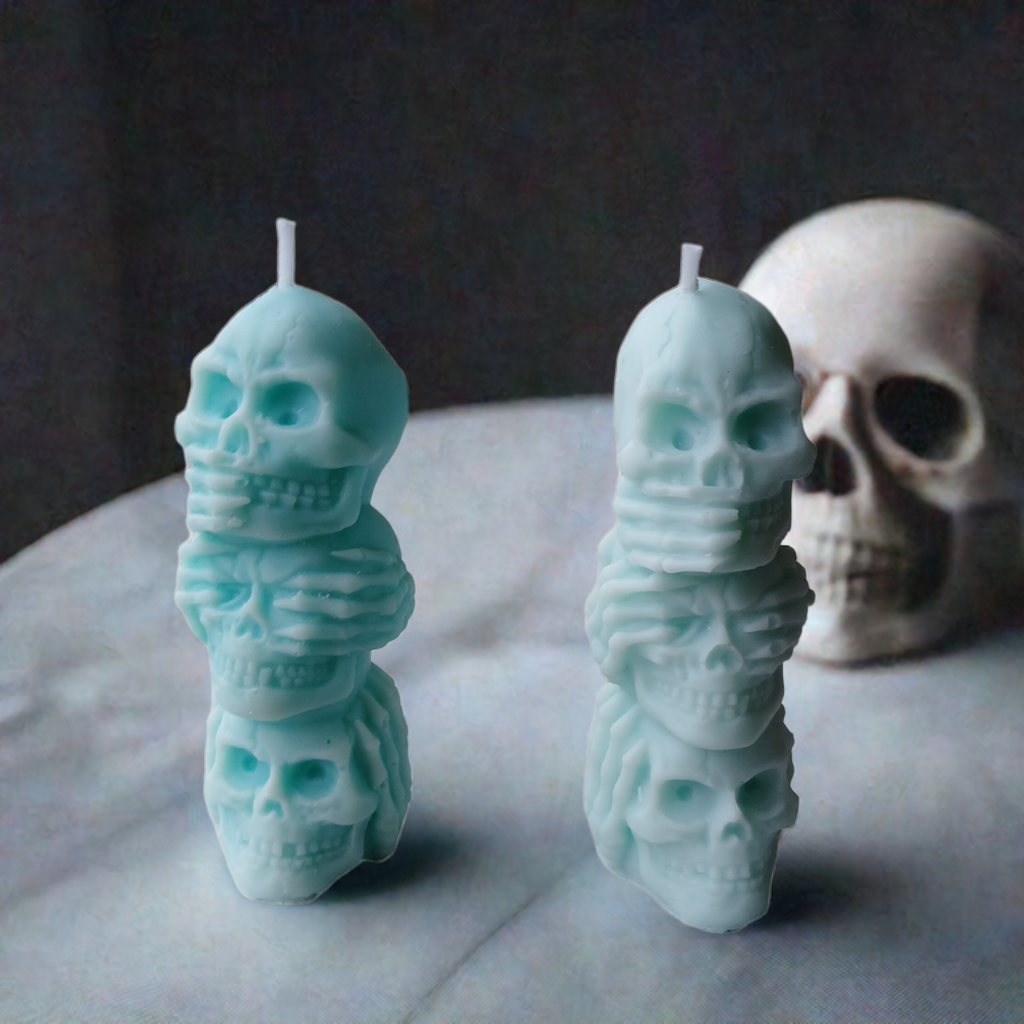Scent Fushion Candles' 3oz Totem Halloween Speak/Hear/See No Evil Skulls candle with dark, gothic skulls for Halloween ambiance.