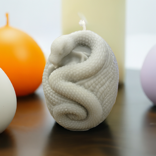 Embrace the magic with our handcrafted snake egg candles.